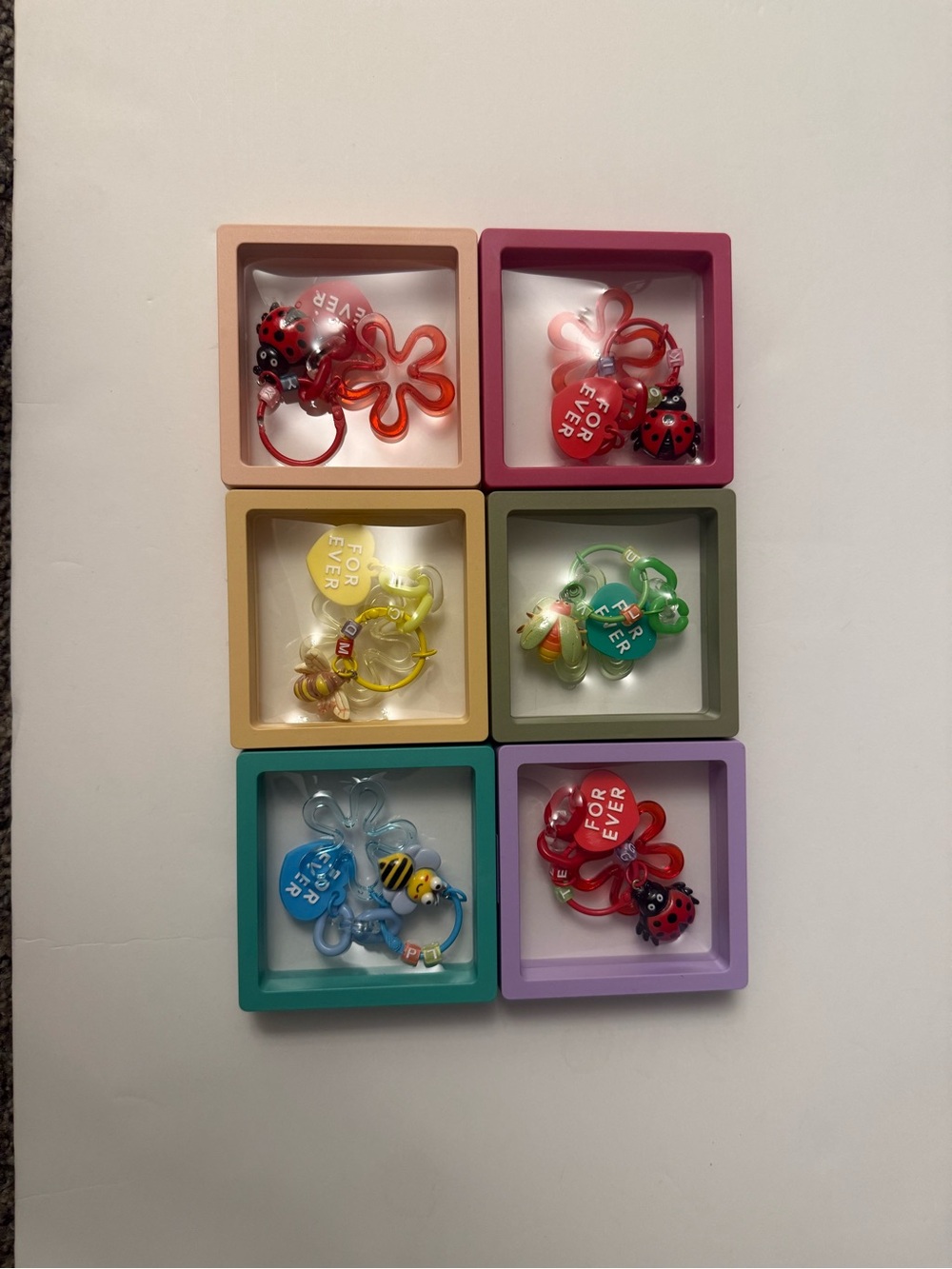Cute Keychain Set - Red, Pink, Yellow, Green, Blue, Purple in a 3D Floating box!